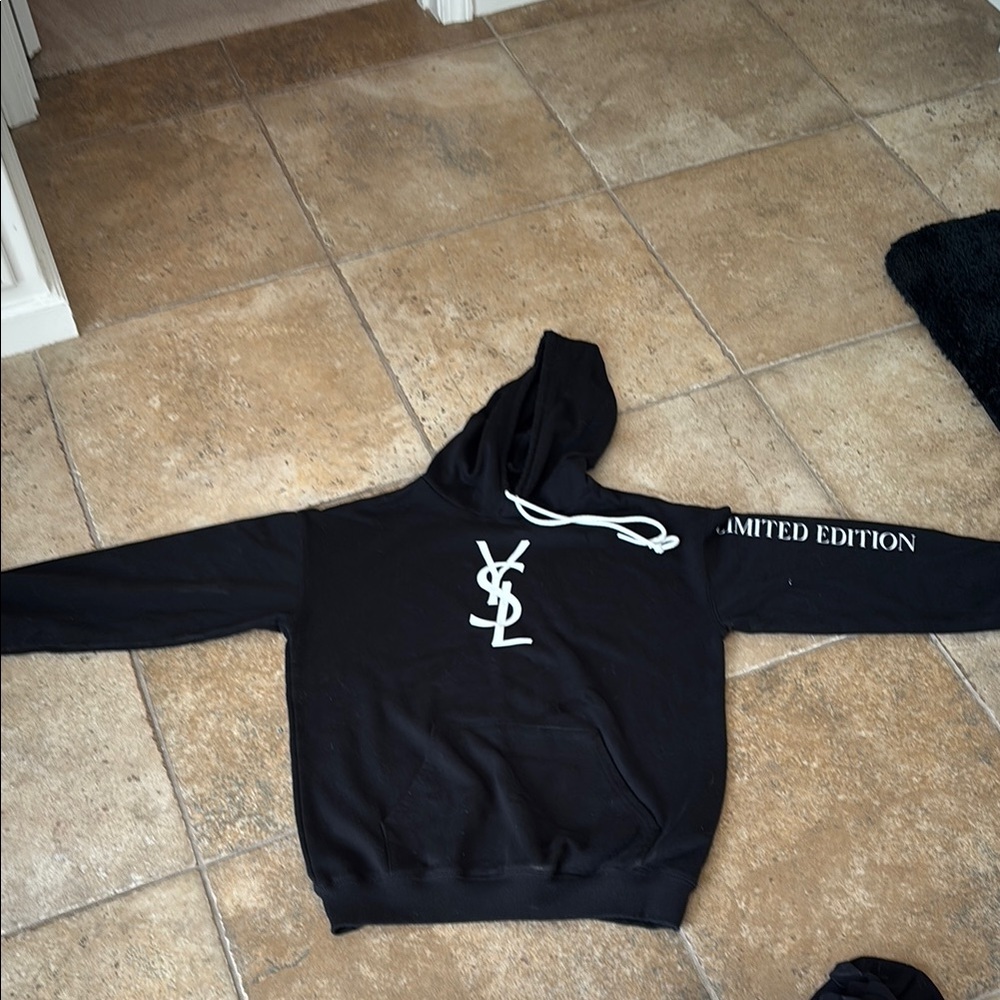 Black Hoodie with White Logo size not marked, but is a medium